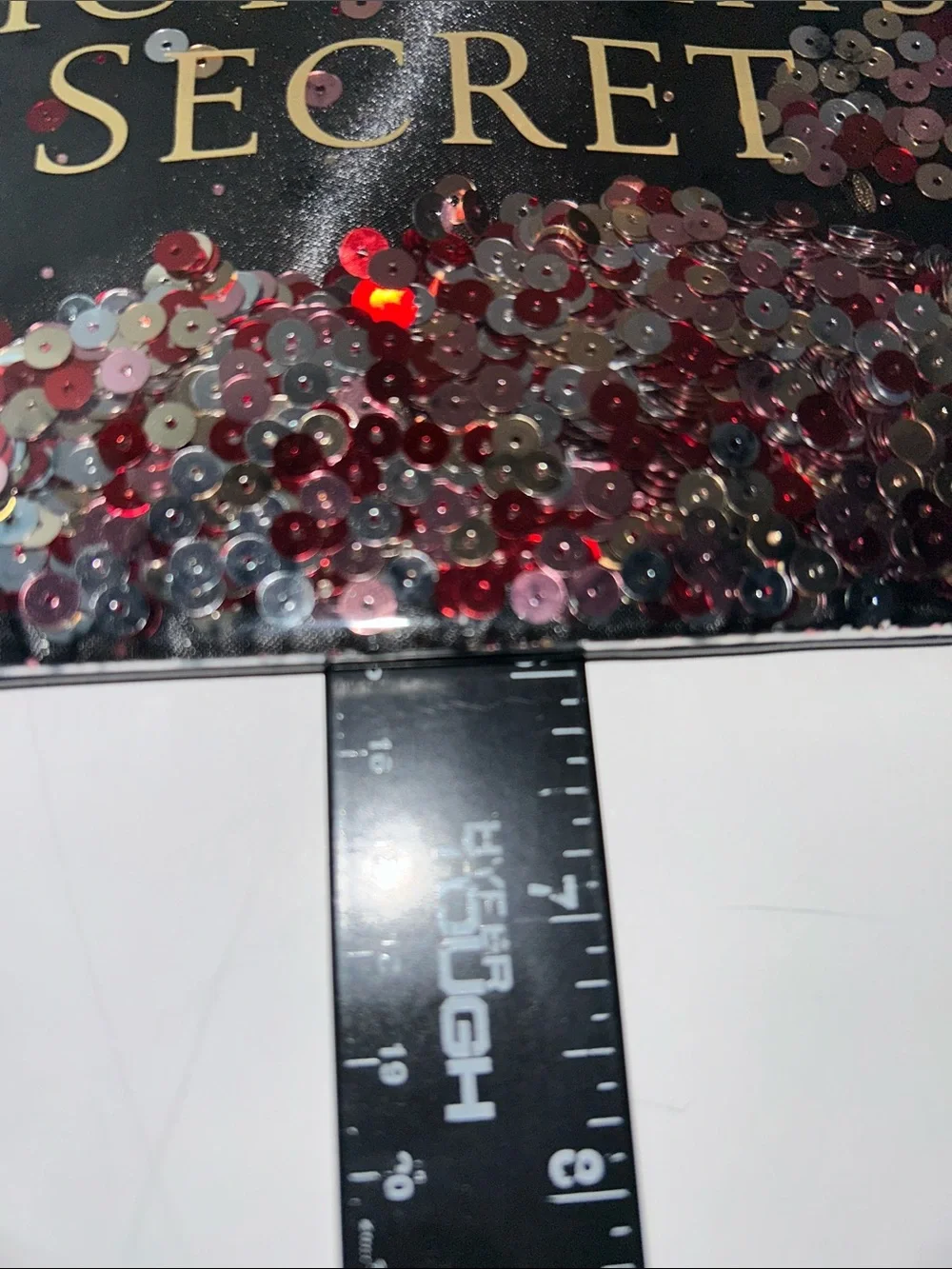 Victoria's Secret Floating Confetti Sequin Wristlet Pouch.